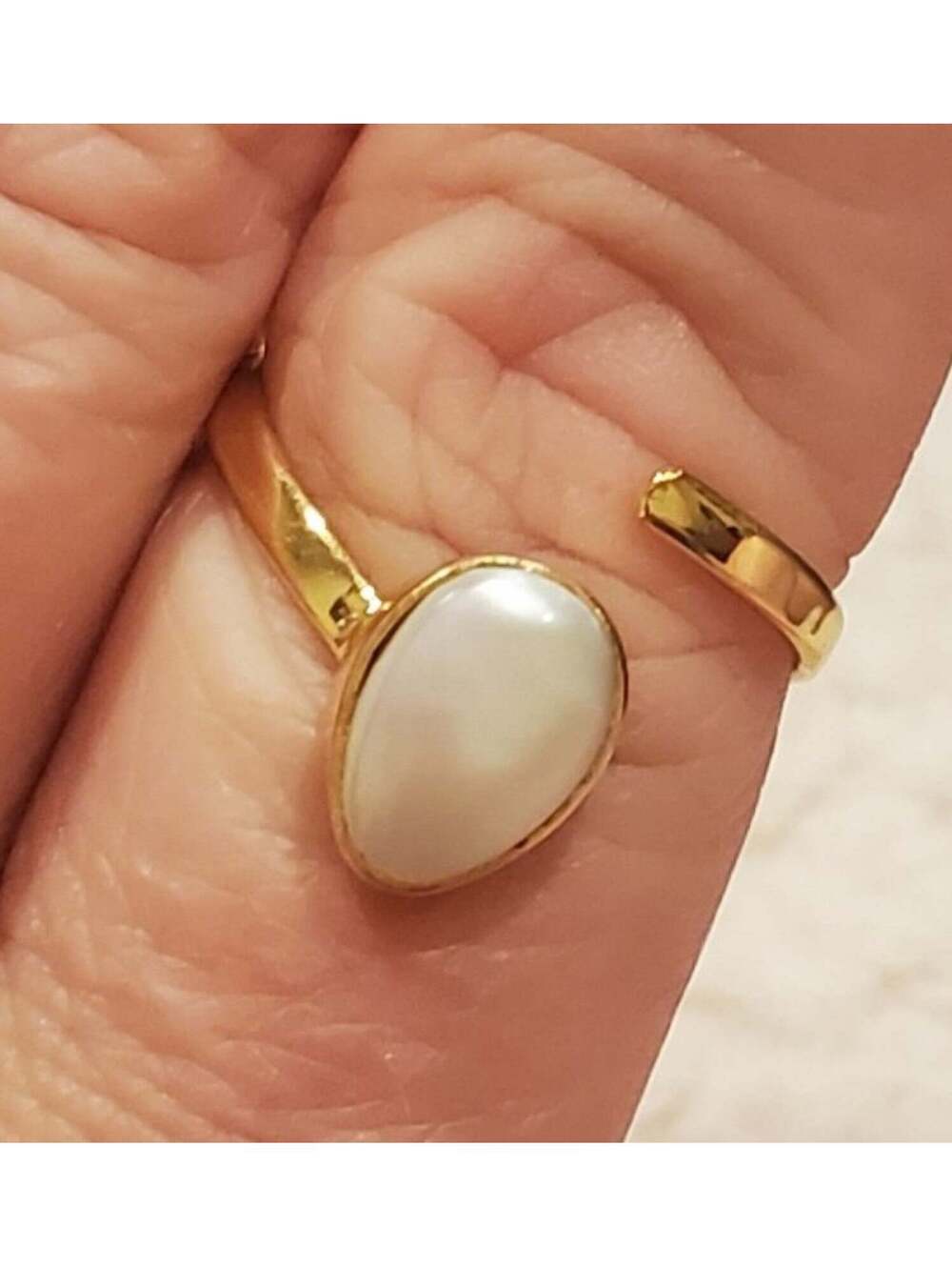Adjustable gold tone pearl ring